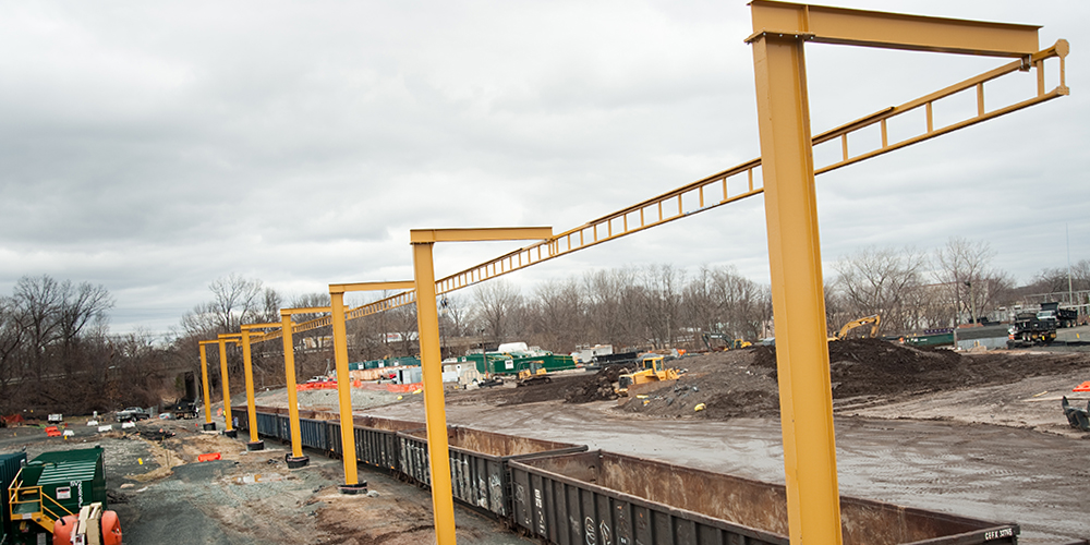 yellow anchor tracks suspended on inverted L