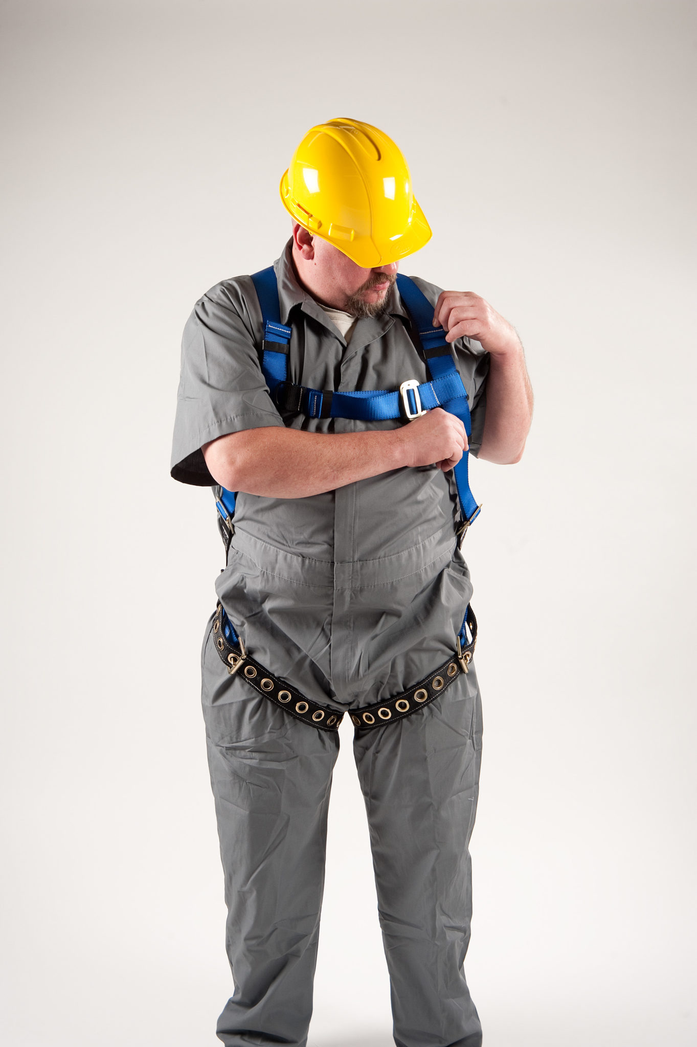 Rigid Lifelines® Fall Protection - Worker in Harness